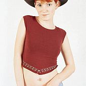 Girl posing undressed cowboy.